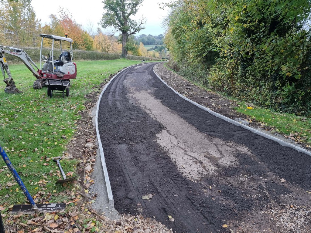 This is a large driveway which is in the process of having a tar and chip driveway installed on by Canterbury Driveways